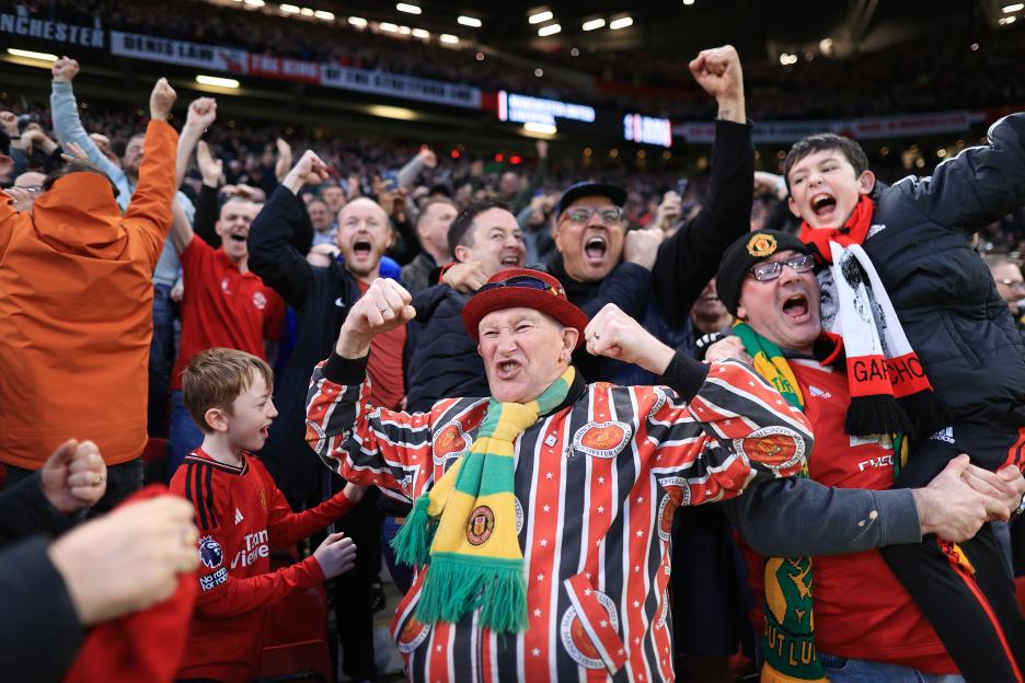 Manchester United fans celebrating after the Emirates FA Cup Quarter Final.