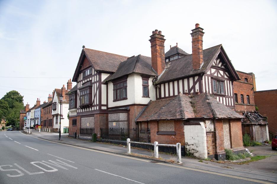 The Allesley Hotel in Coventry, boarded up and derelict.
