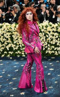 Chappell Roan at the Met Gala in a pink sequined suit.