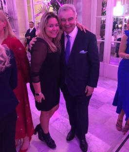 Photo of a woman and a man at an event.