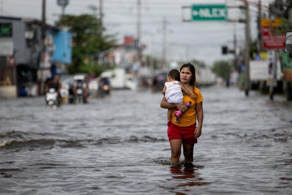 Dozens killed as flash floods and landslides rip through the Philippines after fierce tropical storms
