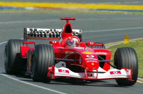 Michael Schumacher driving a Ferrari F1 car.