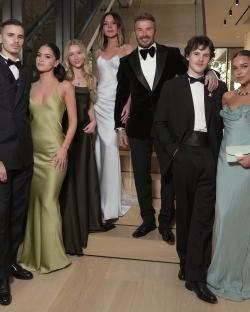 The Beckham family at a formal event.