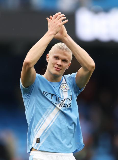 Erling Haaland applauds the fans.