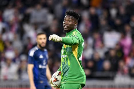 André Onana, Manchester United goalkeeper, gesturing during a soccer match.