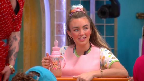 Ella Rae Wise on Celebrity Big Brother, holding a baby bottle.