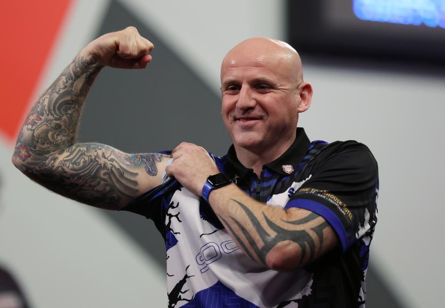Alan Soutar of Scotland celebrating his victory during the Third Round match.