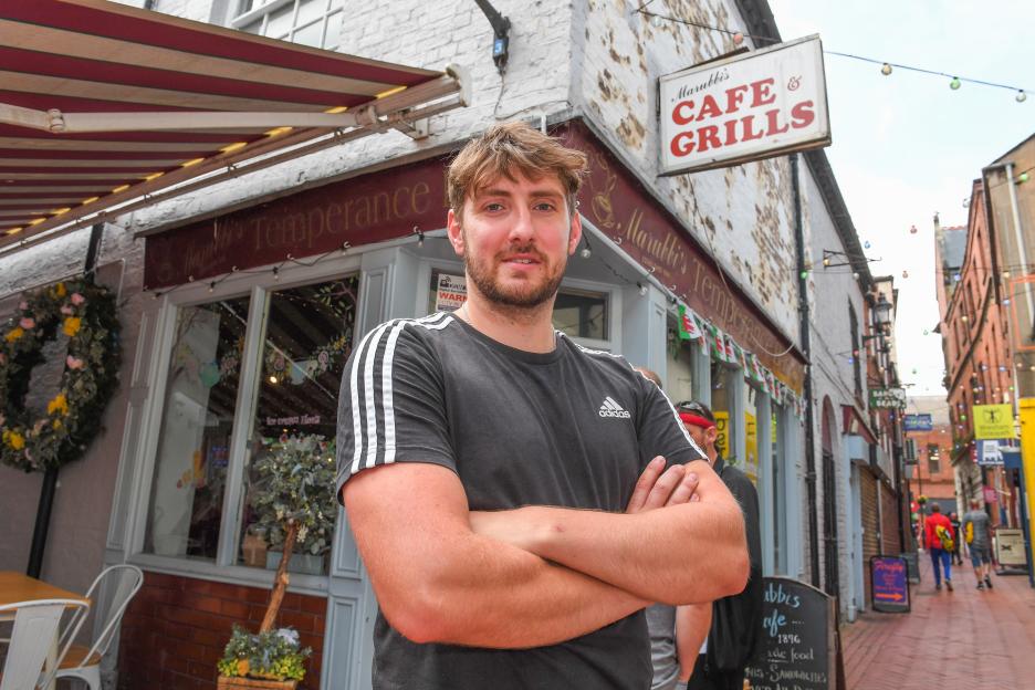 Hari Gould of Marubbi's Cafe & Grill, arms crossed.