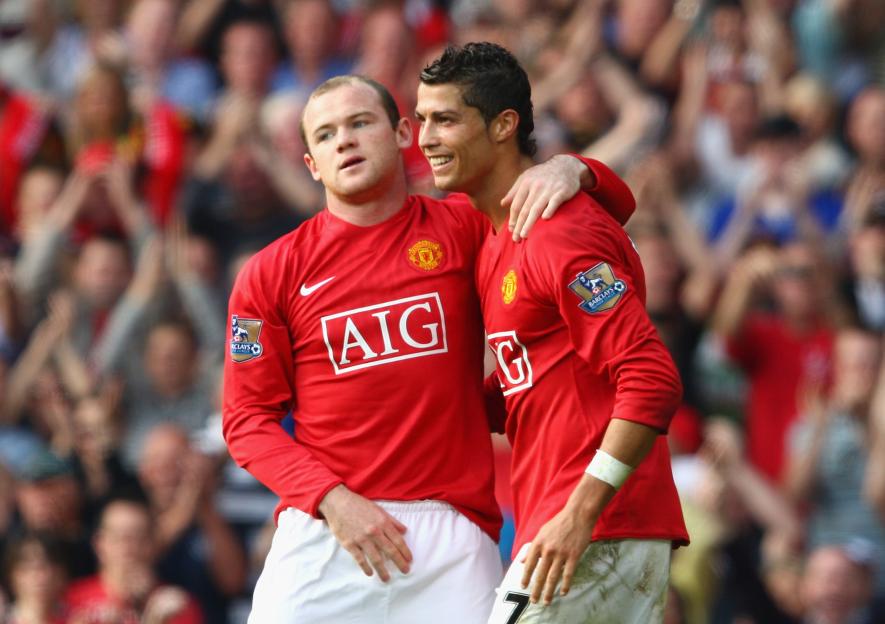 Wayne Rooney and Cristiano Ronaldo of Manchester United celebrating a goal.