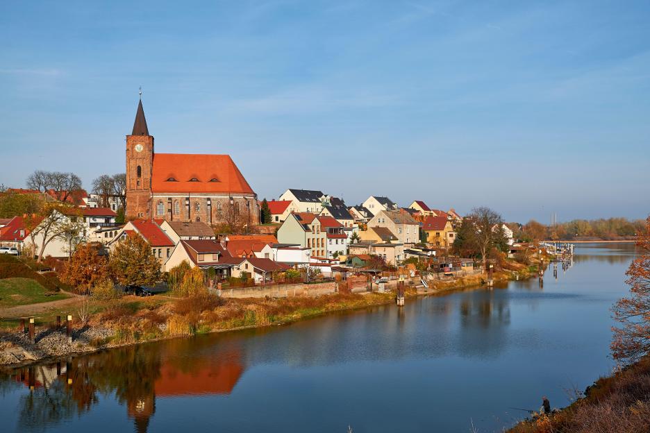Eisenhüttenstadt, Germany, with the Nikolaikirche church on the Oder-Spree Canal.