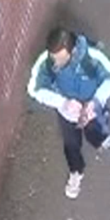 Surveillance image of a person on a Metro train.