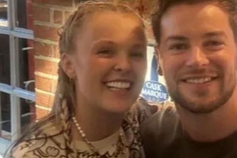 Watch as Chris Hughes and JoJo Siwa get VERY close on cosy night out after CBB as onlookers say ‘something is going on’