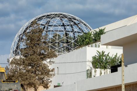 Exterior view of UNVRS nightclub in Ibiza, featuring a geodesic dome.