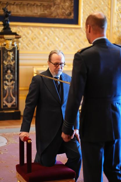 Actor Gary Oldman is knighted by the Prince of Wales at Windsor Castle.