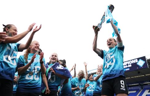 London City Lionesses players celebrating their championship win.