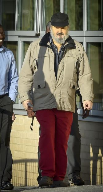 Peter Sutcliffe, the Yorkshire Ripper, arriving at a hospital.