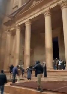 Tourists being evacuated from Petra's Treasury after flash floods.