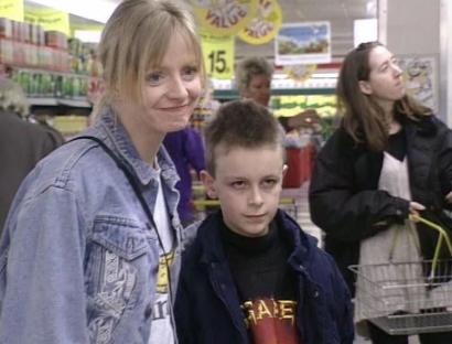 Woman and boy in a supermarket.