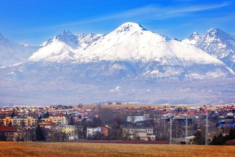 View of Poprad city with the High Tatras mountains in the background.