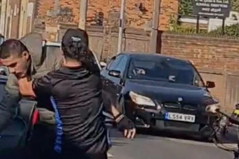 Watch JustEat rider pin Domino’s delivery driver against car in bizarre ‘road-rage’ tussle