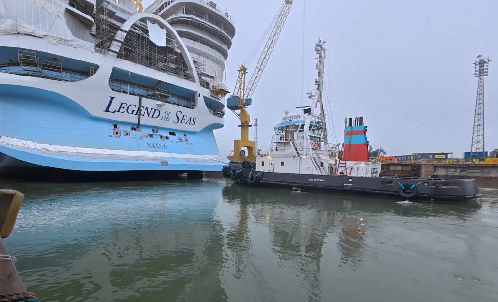 The Legend of the Seas cruise ship being floated in a dry dock.