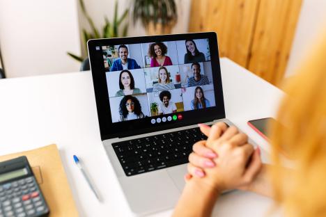 Laptop screen showing a group video call.