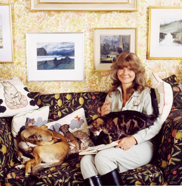 Jilly Cooper with her dog and cat at home.