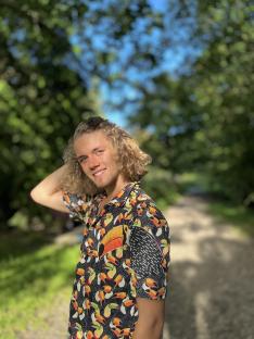 Man wearing a toucan-print shirt.