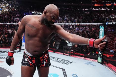 Jon Jones giving a thumbs up before a UFC heavyweight championship fight.