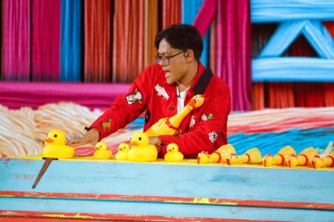 Papi on Britain's Got Talent playing with rubber ducks and chickens.