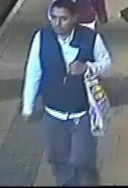 Surveillance image of a person of interest.