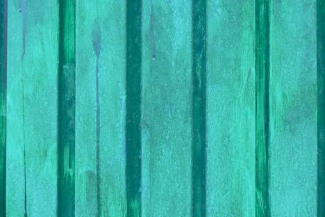 Teal corrugated metal texture.