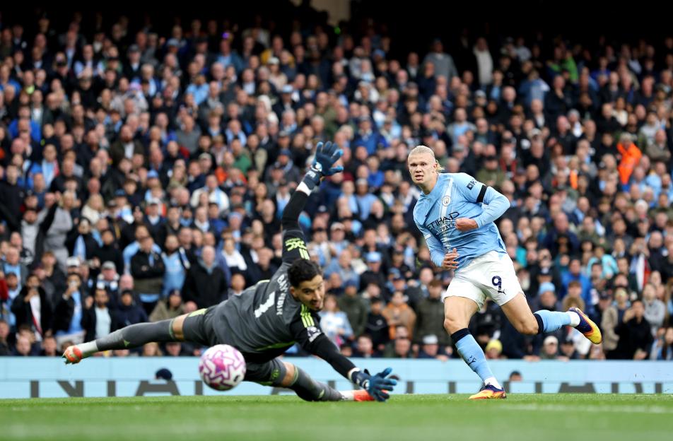 Erling Haaland of Manchester City scoring a goal.