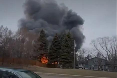Plane crashes into Minnesota home with house engulfed in flames as firefighters battle huge blaze