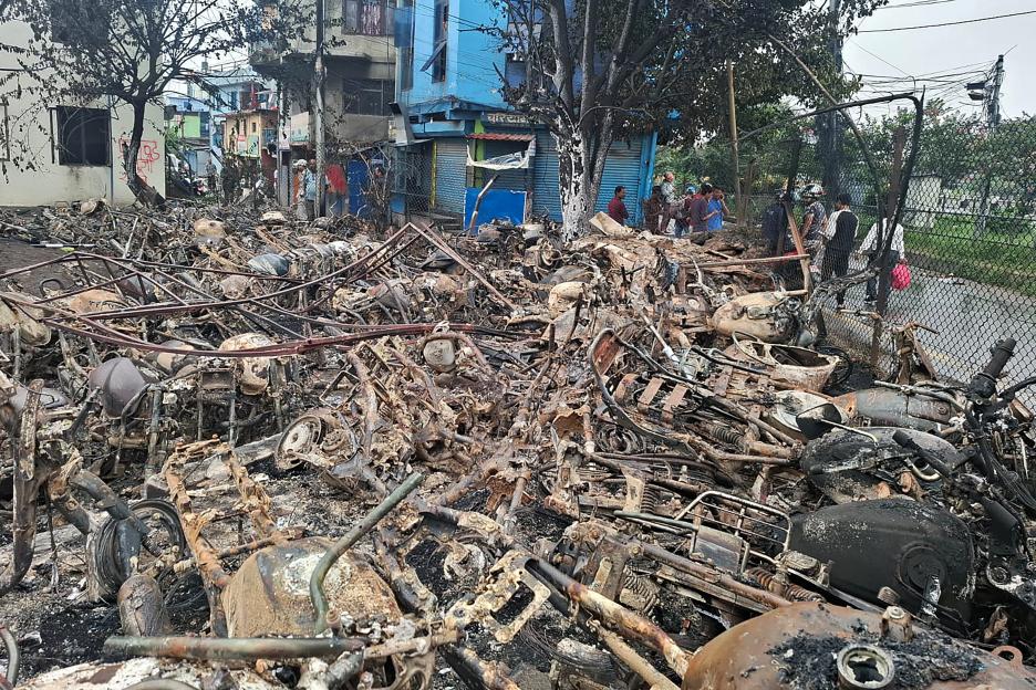 Burned-out vehicles in Kathmandu following Nepali demonstrations.