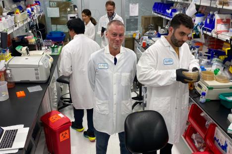 Scientists in a lab using blood to make antivenom.