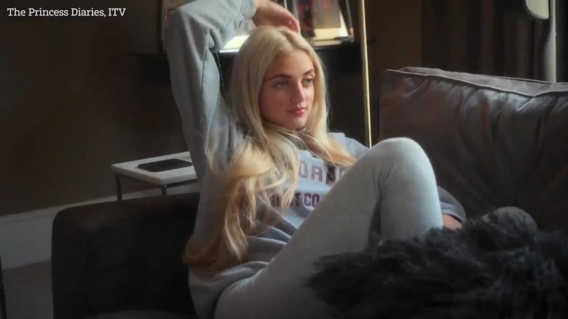 Princess Andre on a couch, reacting to online messages.