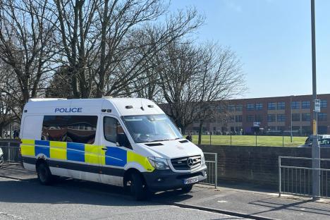 School stormed by intruders in horror attack that left teachers ‘bleeding & crying’ is targeted AGAIN – as boy arrested