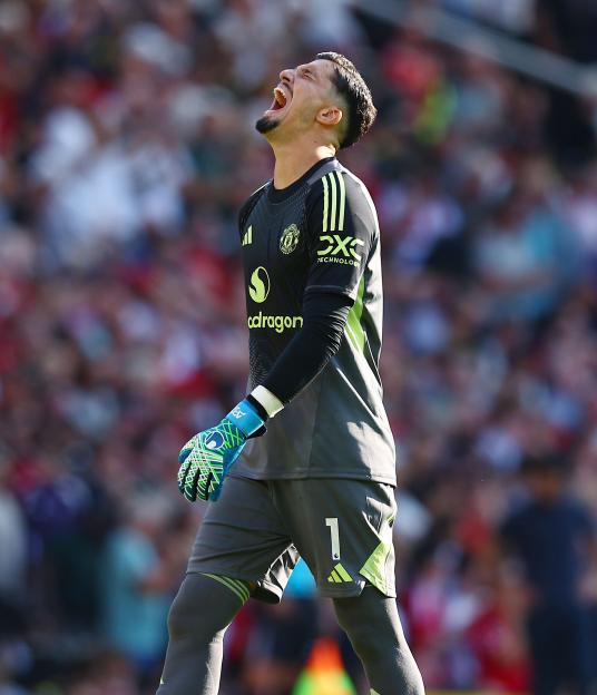 Manchester United goalkeeper Altay Bayindir reacts during a game.