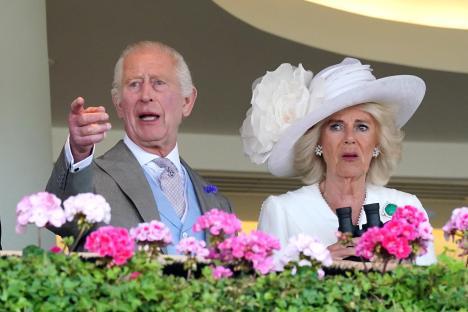 King Charles III and Queen Camilla at a horse race.