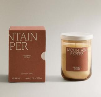 Mountain Pepper scented candle in glass jar with box.