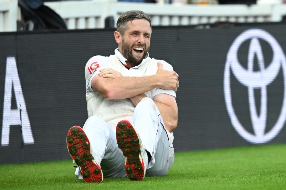 Chris Woakes of England in pain after injuring his shoulder.