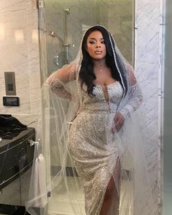 Melanie Kamayou in a sequined wedding dress and veil.