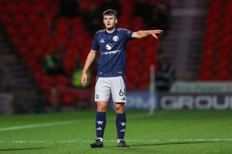 Manchester United U21's defender Jack Kingdon gesturing during a soccer match.