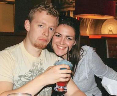 Photo of a man and woman at a restaurant.
