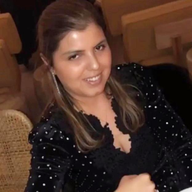 Marissa Laimos wearing a black top with white polka dots.