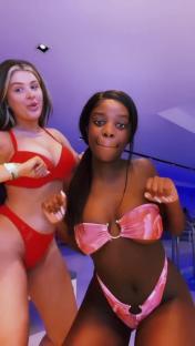 Liberty Poole and Kaz Kamwi in bikinis.