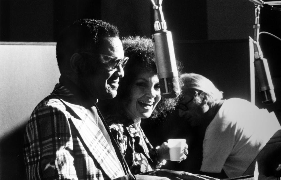 Black and white photo of Cleo Laine and Ray Charles recording Porgy and Bess.