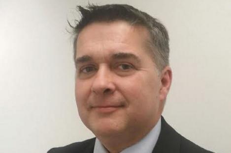 Headshot of Paul King.