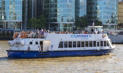 A City Cruises boat tour on the River Thames in London.